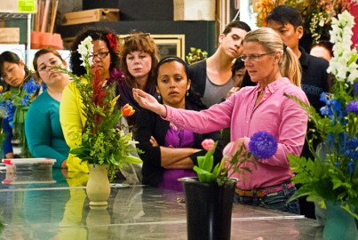 After finishing their first design of floral arrangement for this semester, 15 students in the Flower Shop Procedures and Basic Designs class gather around Jenny Tabarracci, an instructor in Environmental Horticulture & Floristry Department at CCSF, listen to her critiques on each student’s floral design. City College of San Francisco, San Francisco, California. August 24th¸2013. Photo by Ekevara Kitpowsong/The Guardsman