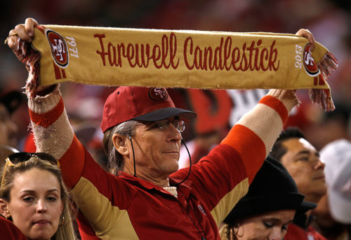 A San Francisco 49ers fan holds up a scarf during their game against the Atlanta Falcons in the third quarter at Candlestick Park in San Francisco, Calif., Monday, Dec. 23, 2013. The 49ers defeated the Falcons, 34-24. (Nhat V. Meyer/Bay Area News Group/MCT)