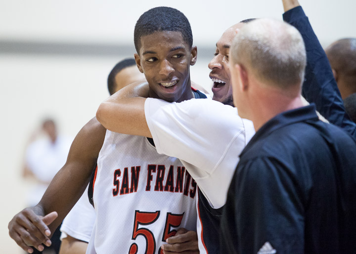 In this March 9, 2013, file photo - Delon Wright (left) is congratulated by his teammate following a basketball win against Santa Rosa College. The Rams won the match 88-54 and remain undefeated with 31 wins. Photo by Santiago Mejia/The Guardsman