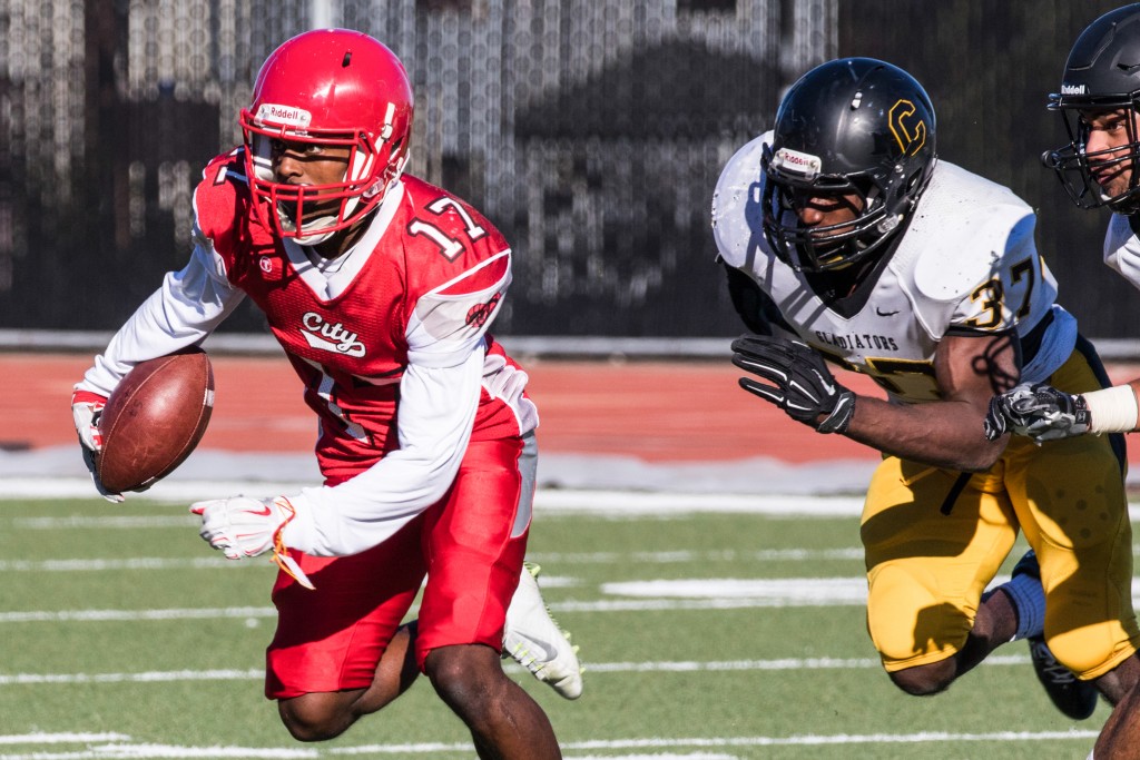 Anthony Porter, #17 sophomore wide receiver being chased by Chabot defenders, Northern California Championship game at George M. Rush Stadium 11-28, photo by Peter Wong / The Guardsman