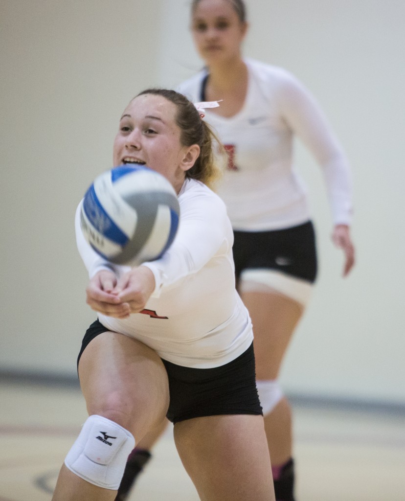 City College’s Emma Seslar (4) returning the ball during a Volleyball game with Cabrillo College at Ocean Campus, on Wednesday Oct. 28, 2015. (Photo by Khaled Sayed/The Guardsman)