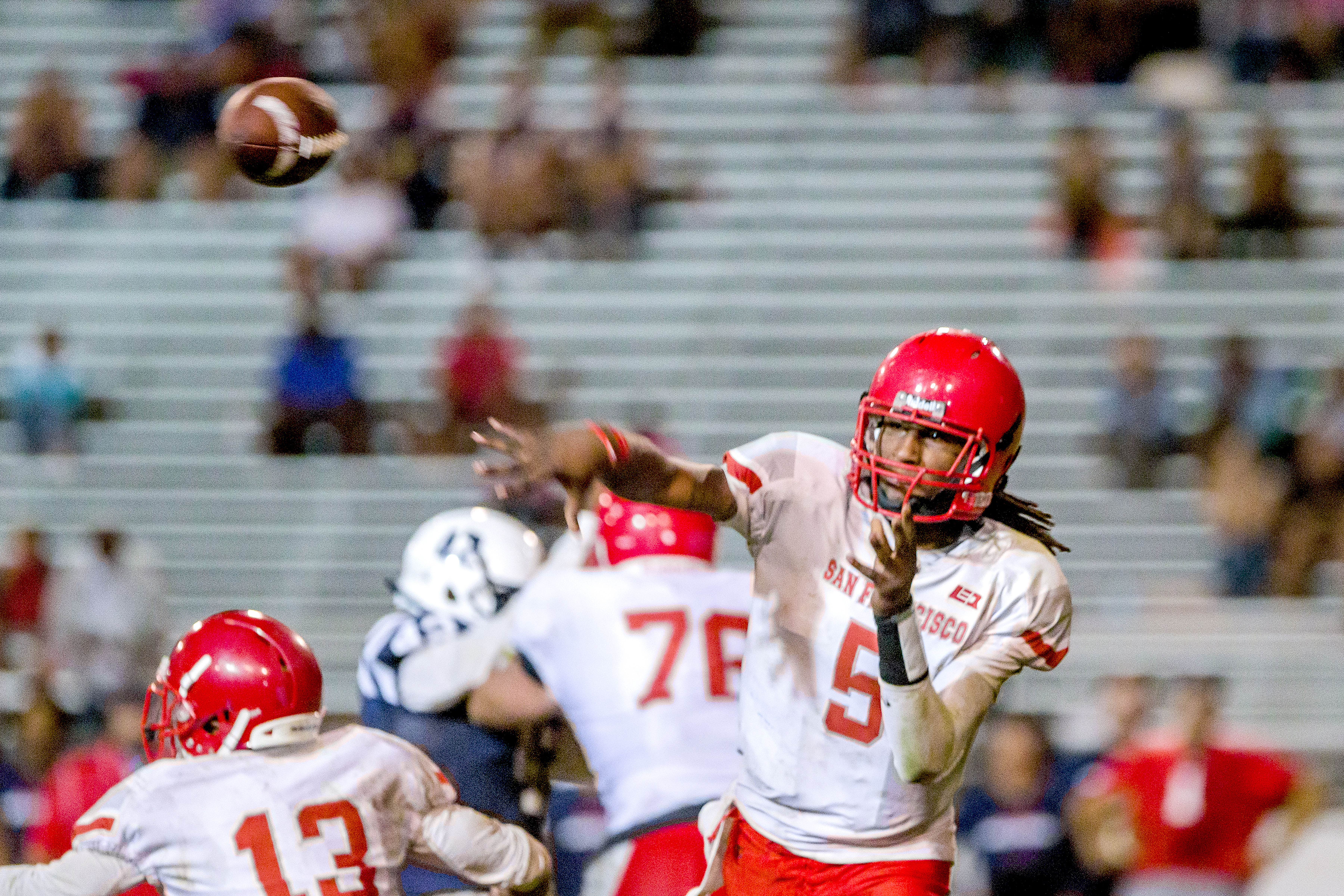 Freshman Lavell McCullers throws one of his 34 completions during an away game at American River College on Saturday, Sept. 17. (Photo by Eric Sun/Special to The Guardsman)