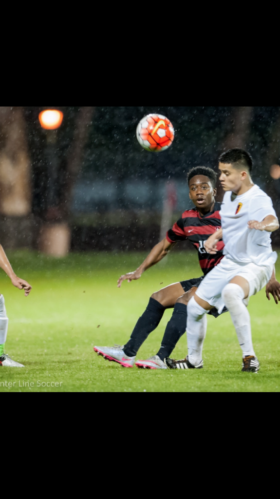 Altamirano (right) steals the ball from his opponent at a soccer game at Stanford University, 2016. Photo courtesy of Andy Altamirano.