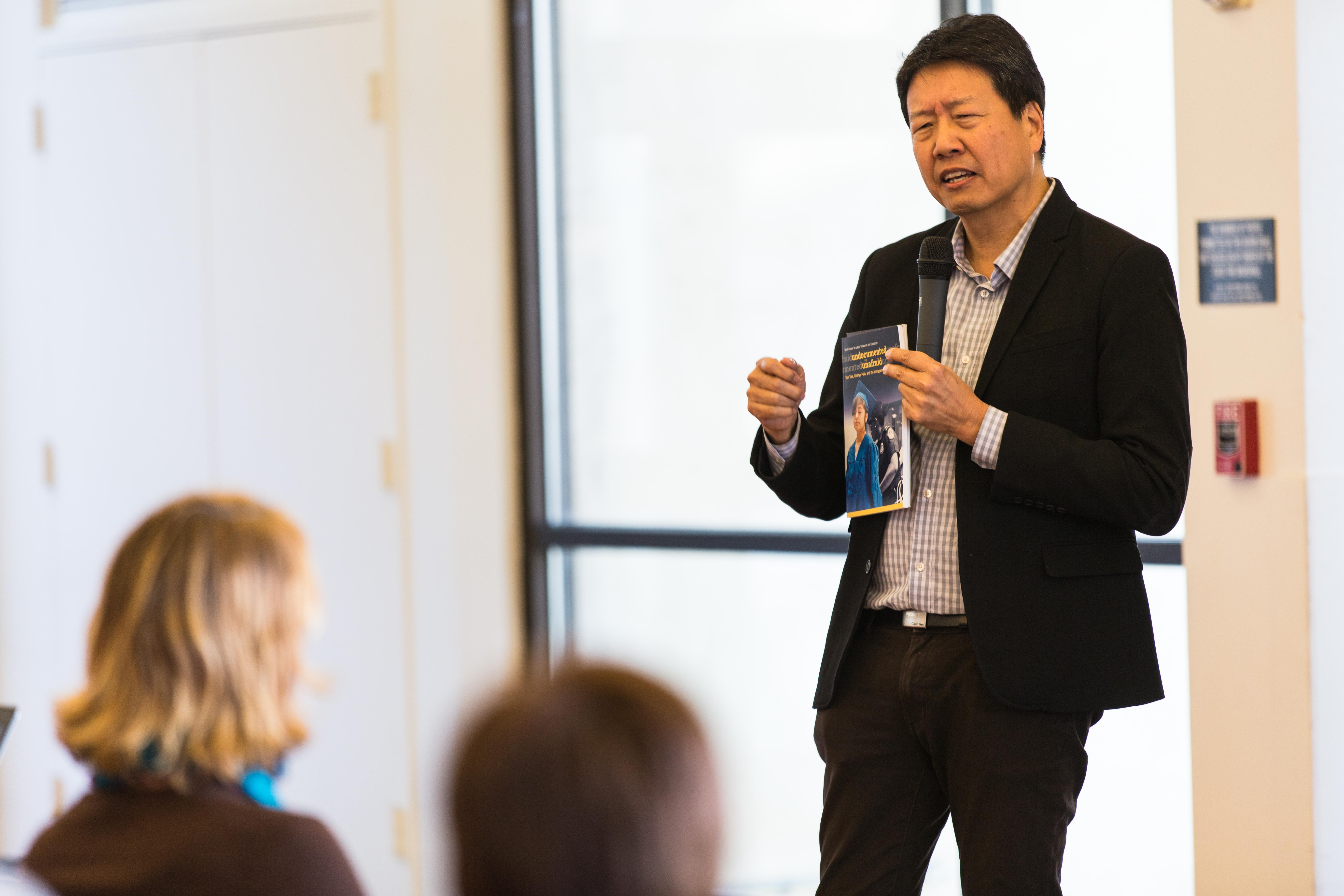 Professor Kent Wong, director of UCLA Labor Center, at the City Cafe in City College on Feb. 28 speaks to students about the publication “Immigrant Youth in the Silicon Valley” and highlights the struggles of undocumented youths in the U.S. Photo by John Ortilla/The Guardsman. 