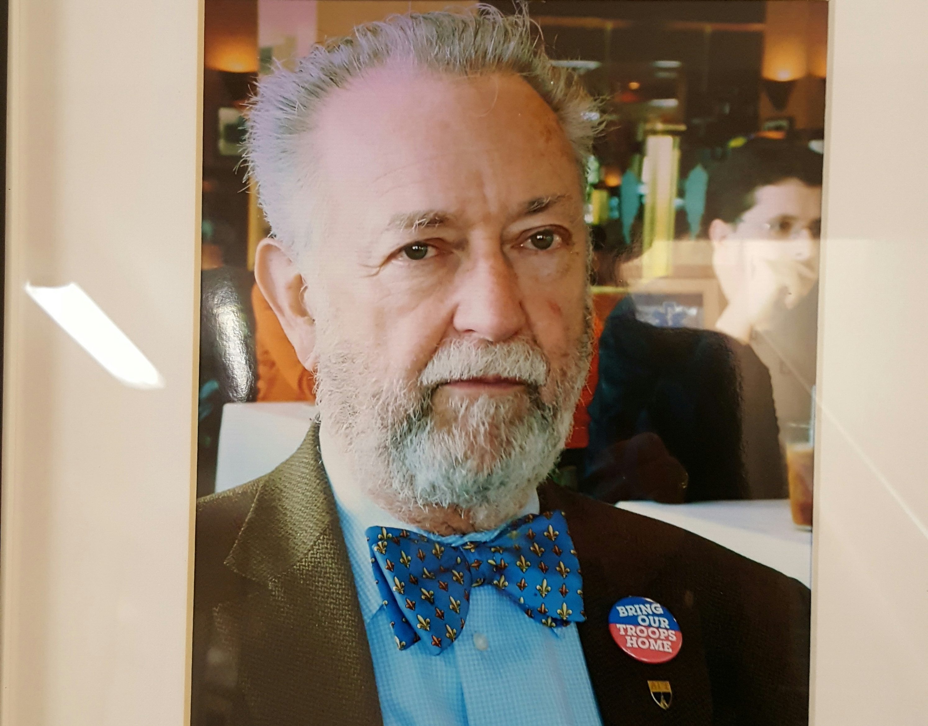 A photo of Ray Berard was featured at the John Adams Auditorium in a frame while they had his eulogy on Sept. 15, 2017. Photo by Barbara Muniz.