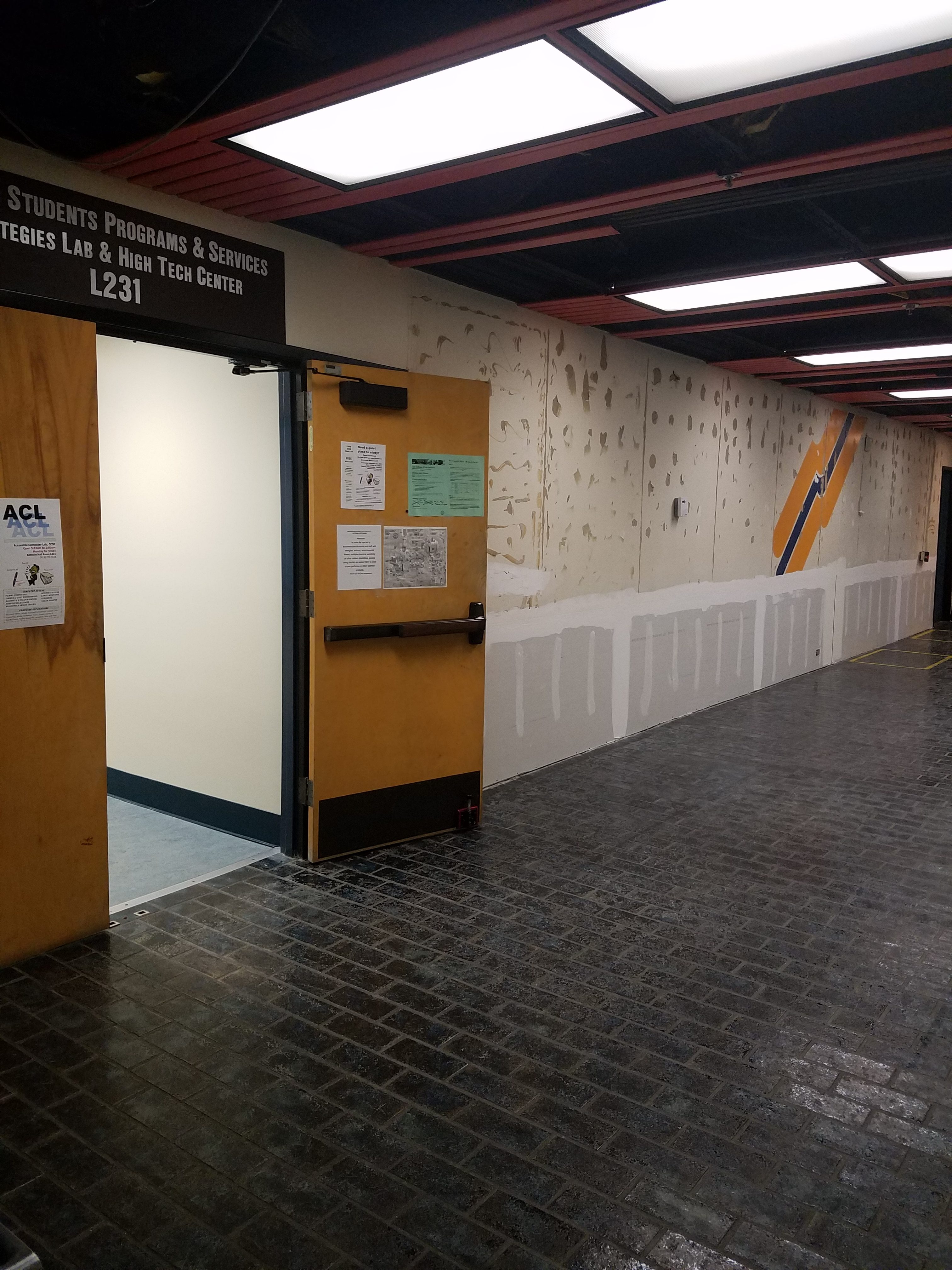 The third and fourth floor of the Batmale Hall were flooded with hot water due to a faucet vacuum breaker. Faculty offices and classes were relocated during repairs. Photo taken by Bethaney Lee on Oct. 10, 2017.