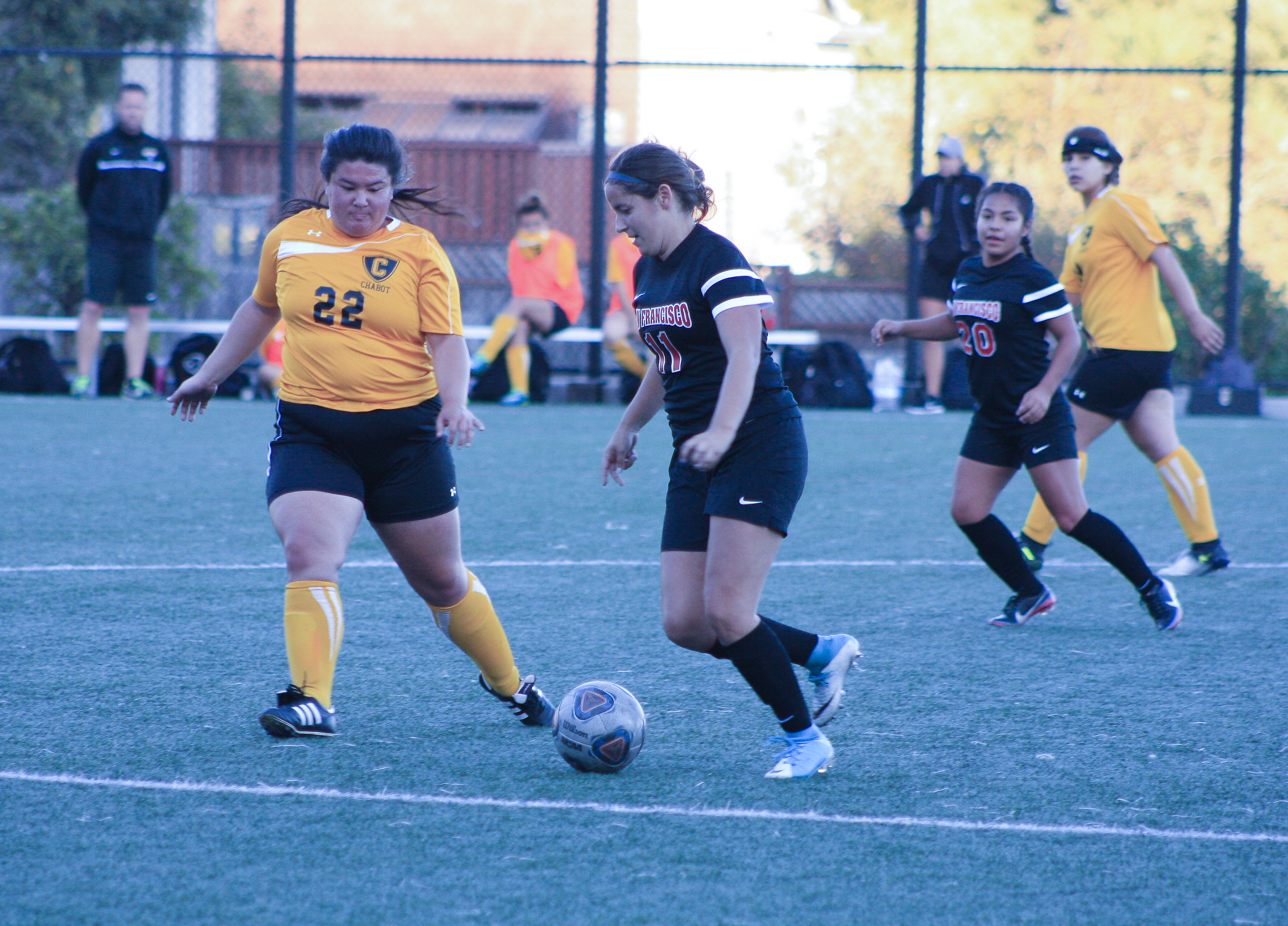 Arantxa Gomez Preito (#20) takes a midfield kick in the second half of the quarter, October 6, Tyesha Sams-Sims (#2) of Chabot College attempts to block her pass. San Francisco. (AP Photo/ Julia Fuller) 