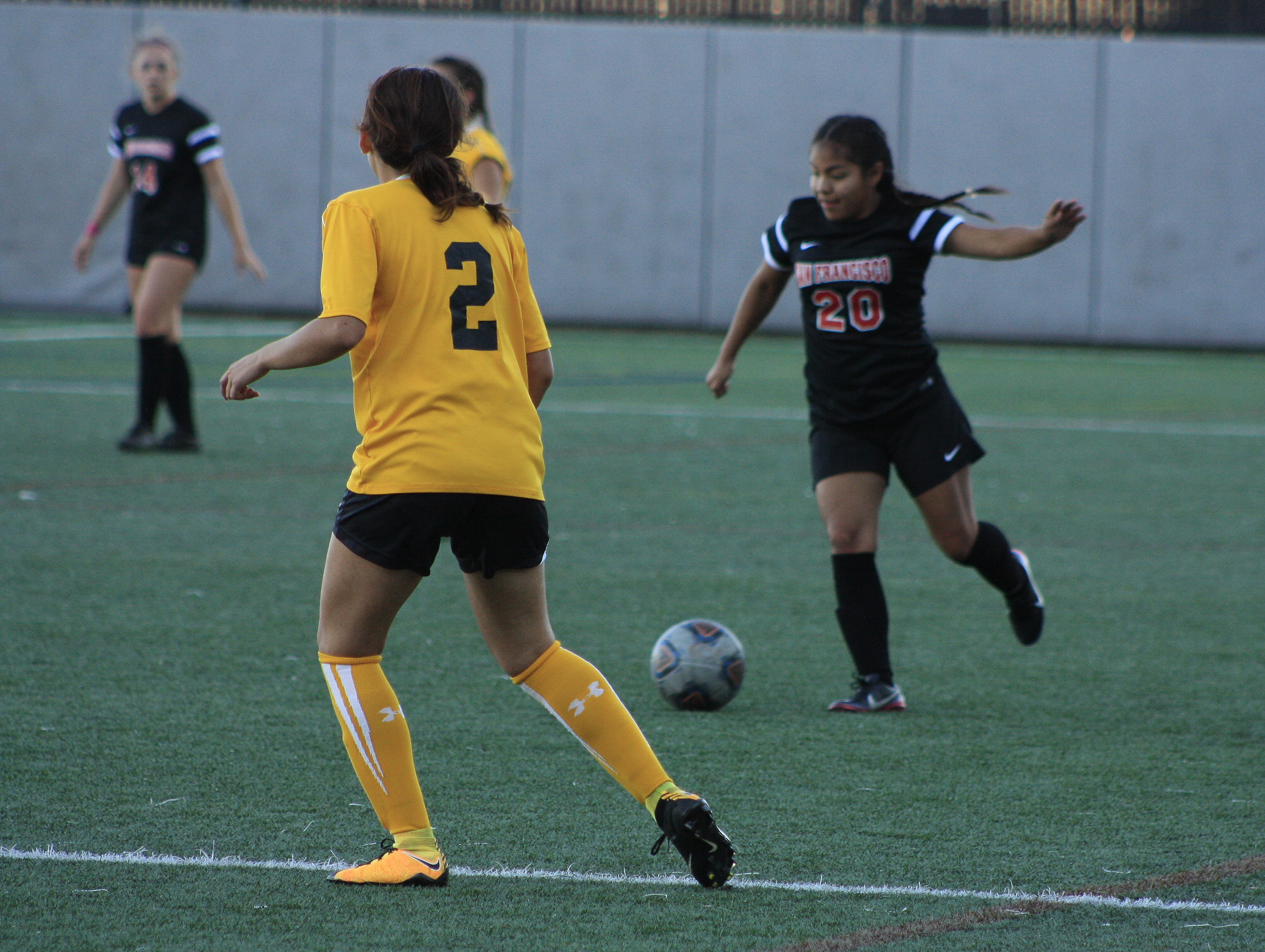 Angelica Gonzalez (#11) of City College goes in for a striking kick against Chabot’s player Isabella Cruz (#22) who attempts to steal the ball from Gonzalez. October 6, San Francisco, (AP Photo/ Julia Fuller) 