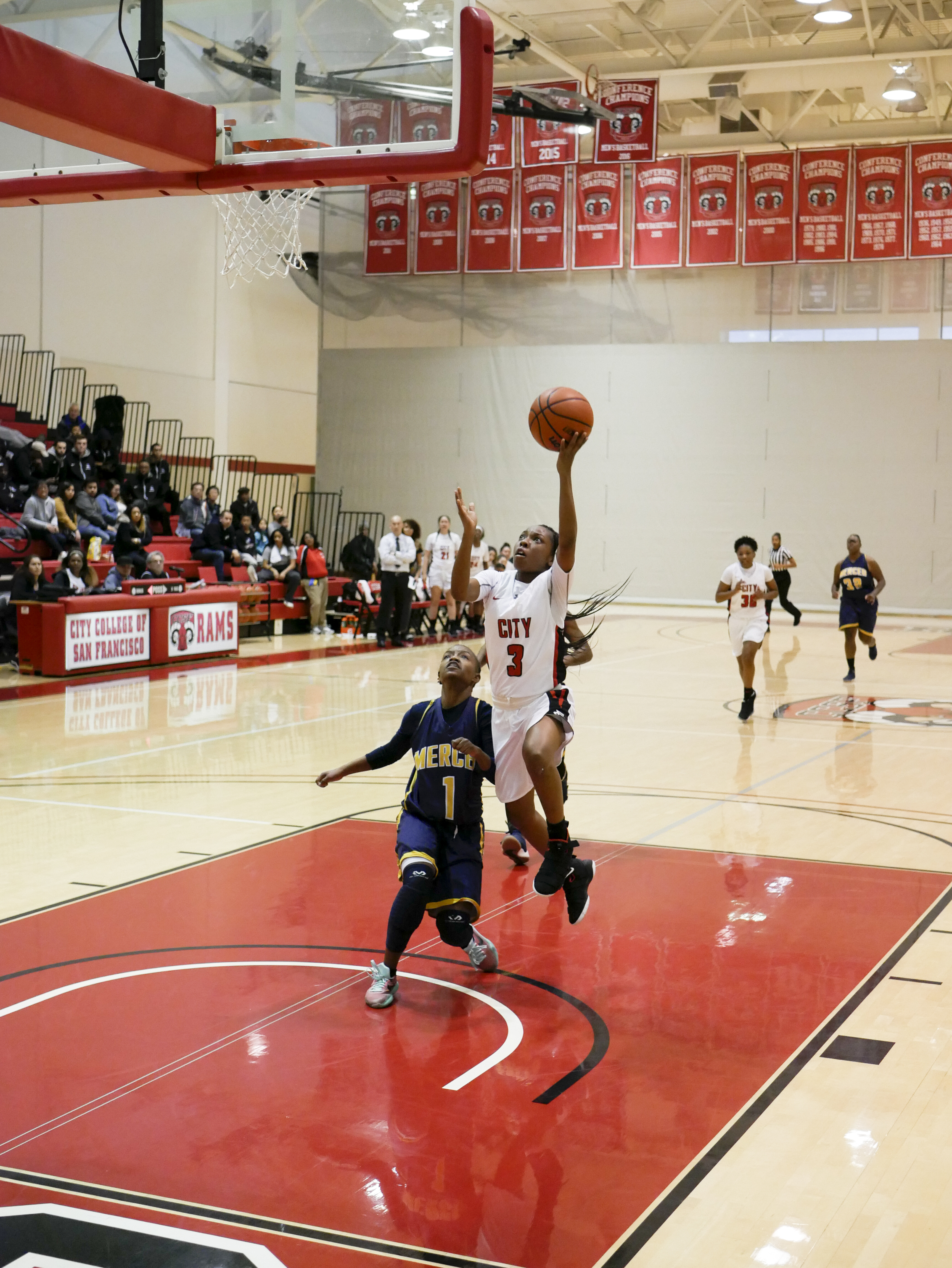 The Rams freshman guard Anissah Dorsey (#3) drives to the basket for a contested lay-up on March 3, 2018. Photo by James Comfort/Special to The Guardsman. 