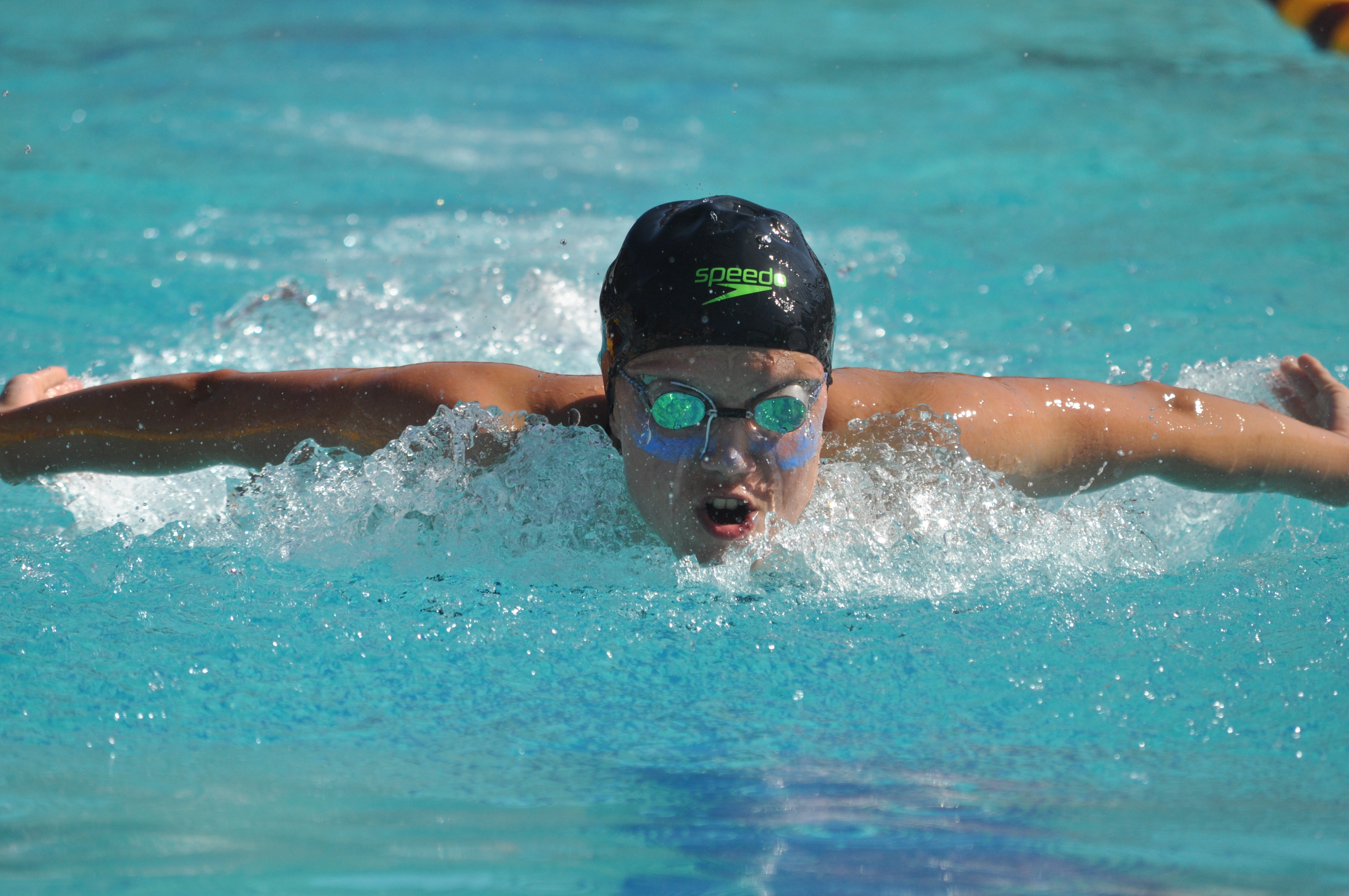 Sophie Greco swims butterfly during the 200 Individual Medley at De Anza College on May 4, 2018. Photo by Peter J. Suter/The Guardsman.