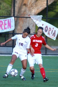 City College Julie Alba (3), battles Hartnell defender Amparo Olivo (16), for possession in the second half of their final game on Nov. 13.  RAMSEY EL-QARE / THE GUARDSMAN