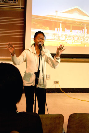 Marikita Kresiel sings ' All by Myself' during the World Music Club's 2009 Karaoke Competition in the Creative Arts Building on Dec. 5, which she went on to win the $200 first prize. ROBERT ROMANO / THE GUARDSMAN