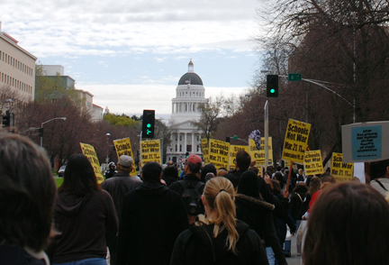 Demonstrators from the march on March 16, 2009 advance on the State Capitol to protest budget cuts to education. RAMSEY EL-QARE / THE GUARDSMAN FILE PHOTO