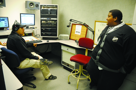 Sports reporter Matias Godinez (left) and Operation Manager Assistant Jerry Weatherford debate baseball teams during The Red Zone commercial break on May 7. RAMSEY EL-QARE / THE GUARDSMAN