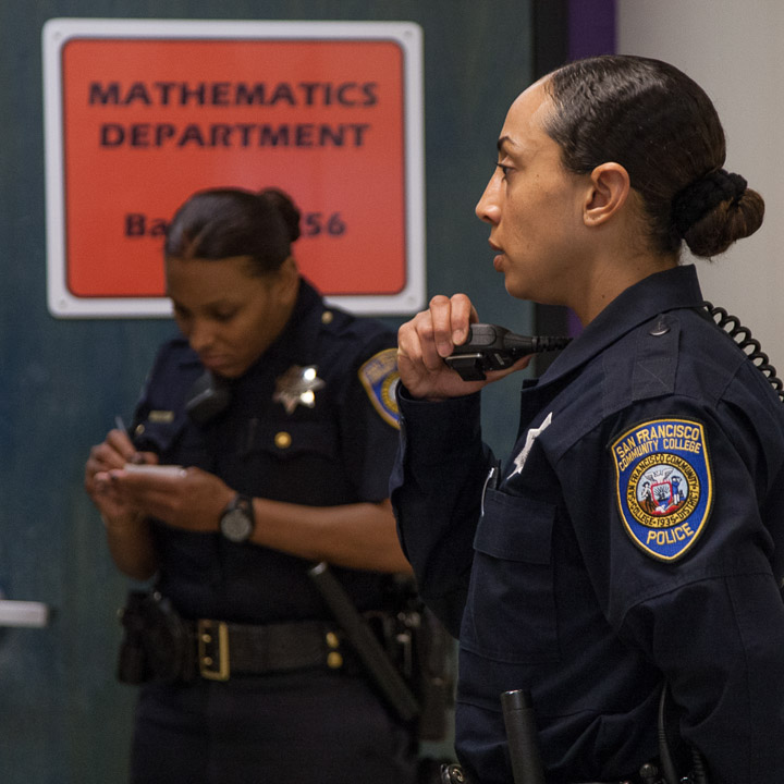 Officers Erica McGlaston and Tiffany Green report to Batmale Hall after receiving a call regarding a disruptive student, Thursday, Feb. 27, 2014, at Ocean campus. Photo by Santiago Mejia/The Guardsman
