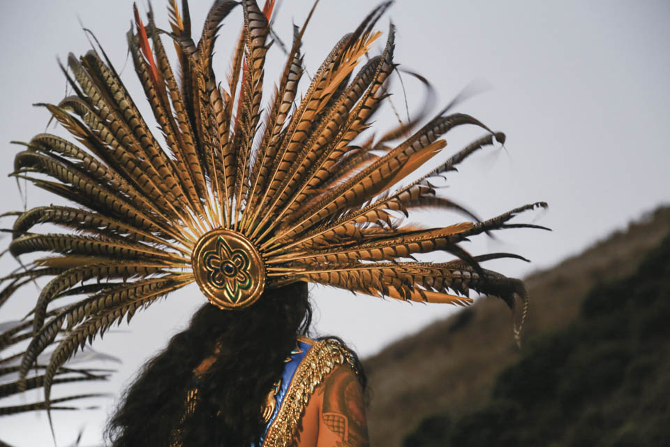 Aztec dancers mark the 5-month anniversary of the death of Alex Nieto with a ceremony of prayers, music and dance at sunrise at the Alex Nieto Memorial, Bernal Heights Park in San Francisco on Aug. 22, 2014. (Photo by Natasha Dangond)
