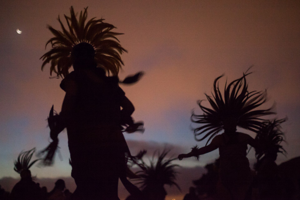 Aztec dancers mark the 5-month anniversary of the death of Alex Nieto  with a ceremony of prayers, music and dance at sunrise at the Alex Nieto Memorial, Bernal Heights Park in San Francisco on Aug. 22, 2014. (Photo by Nathaniel Y. Downes)