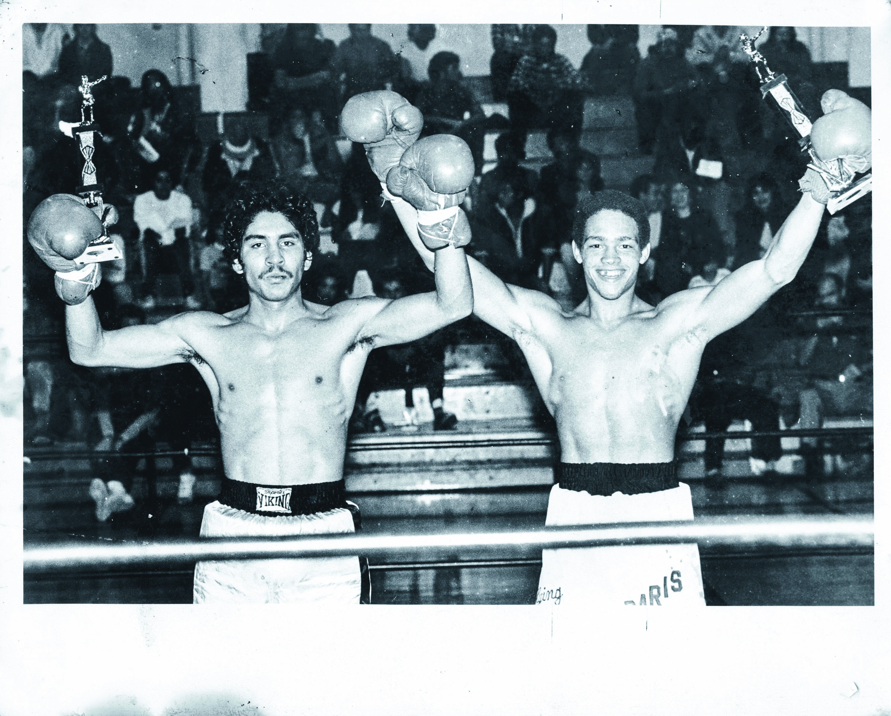 Paris Alexandar (right) celebrates a City College boxing exhibition victory in 1984. (Photo courtesy of Paris Alexander) 