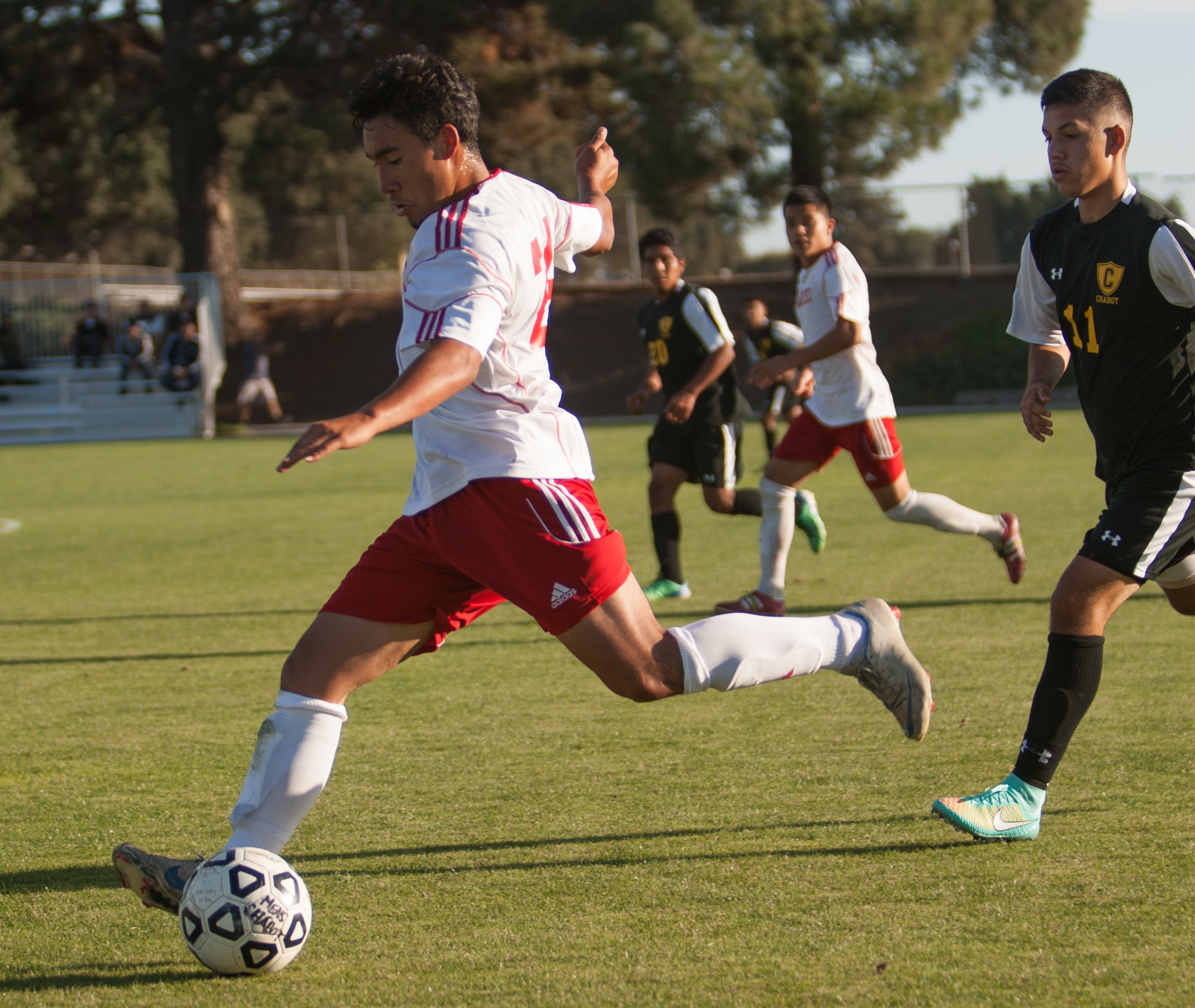 City College Rams soccer player strikes the ball. (Photo by Khaled Sayed)