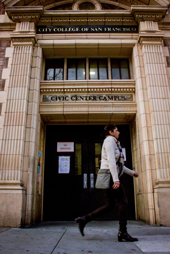 A woman walks by the main entrance of the Civic Center Campus. Wednesday, Feb. 11. (Photo by Jon Brooner)
