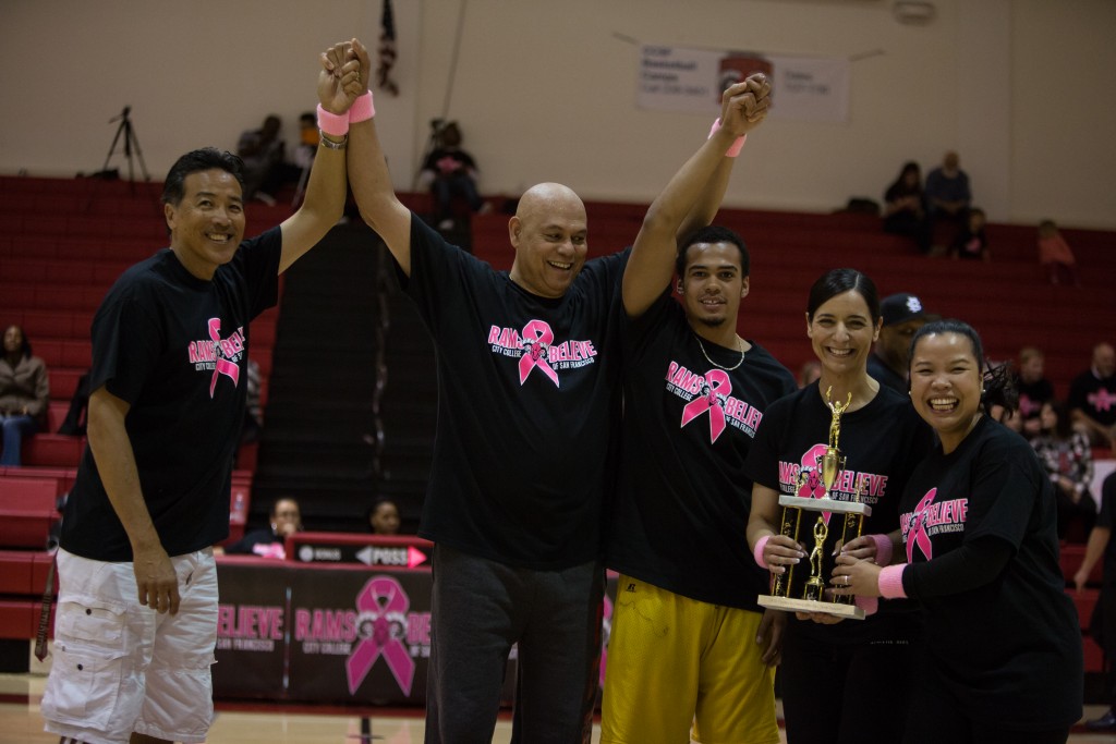 (L- R) Women’s Track and Field Coach Douglas Owyang, City Col- lege Chancellor Dr. Arthur Tyler, student athlete Jalen Jones, City College President Virginia Parras and her special assistant, Grace Esteban, posing proudly with their trophy after winning the halftime “free-throw shootout,” Friday, Feb. 20. (Photo by Khaled Sayed)