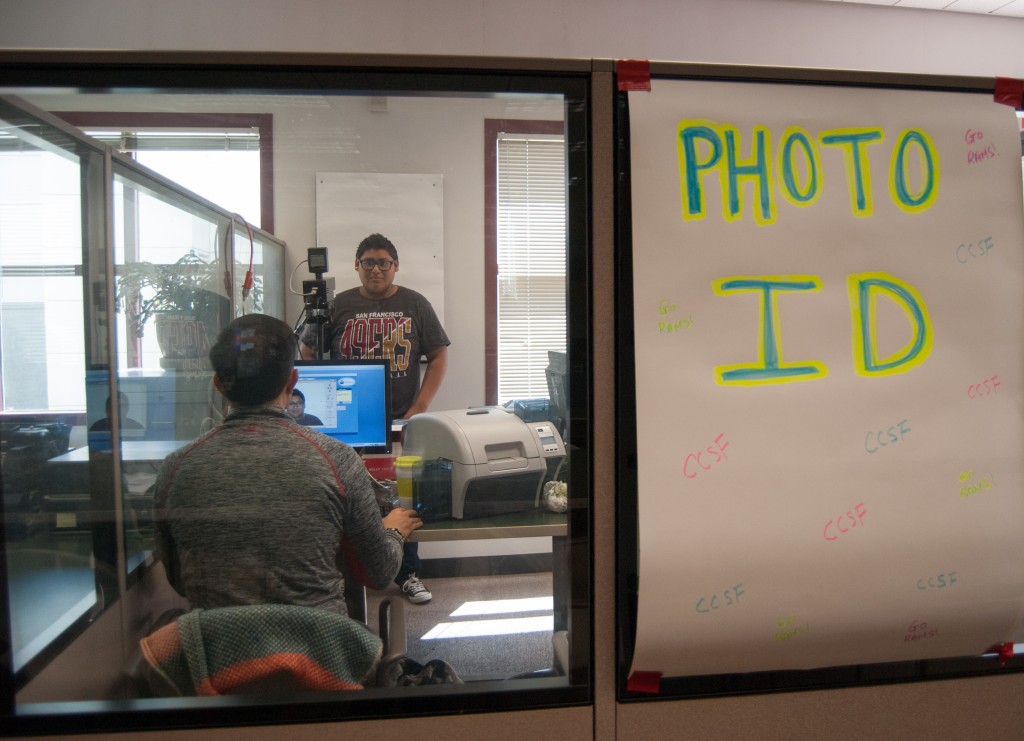Mark Aguilar, Jr. a new admit, takes his ID photo in the Learning Access Center on Friday, April 24 during Frisco Day. New students were being processed to attend City College for Summer and Fall classes. (Photo by Franchon Smith)