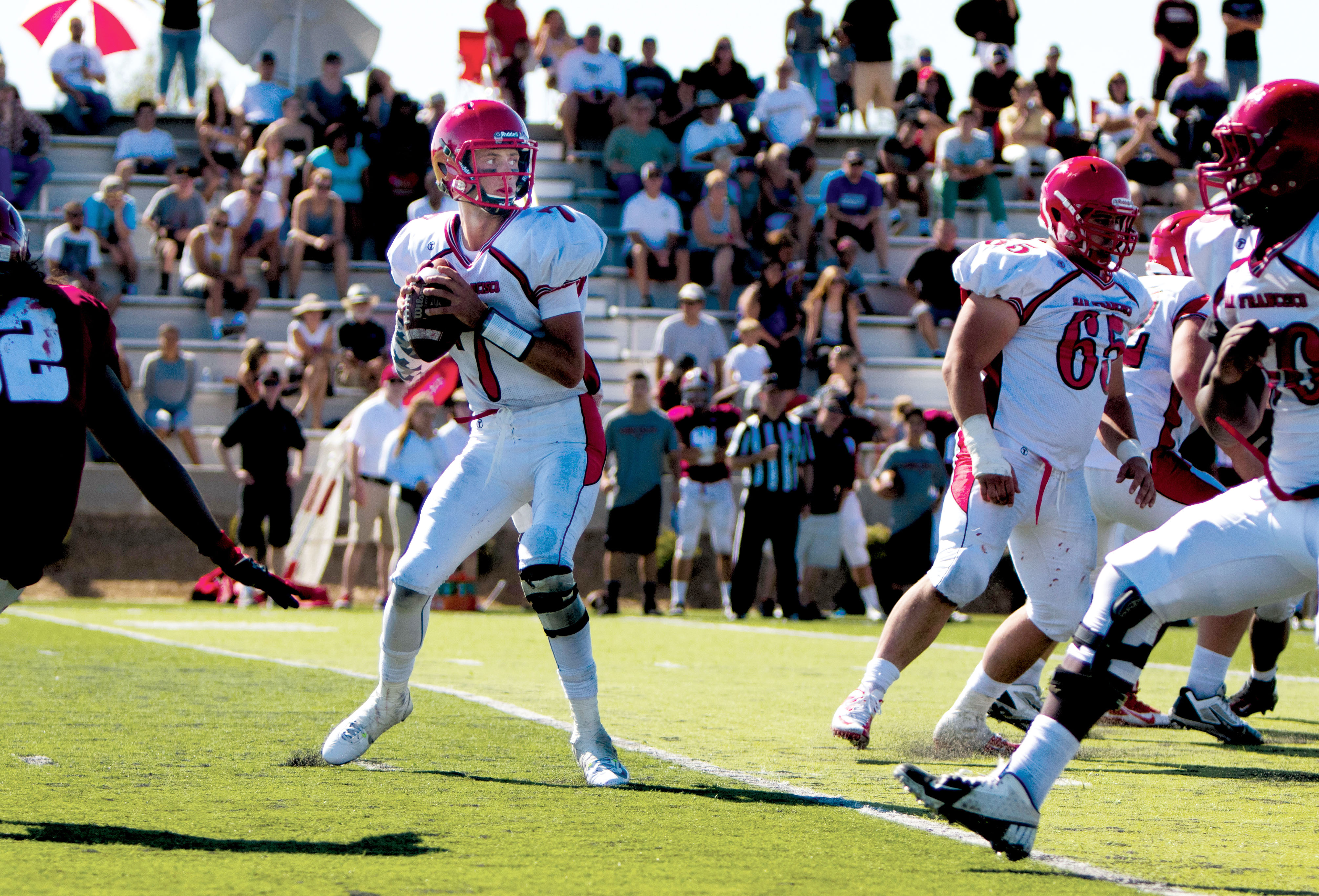 Quarterback Anthony Gordon setting up for a forward pass. Sierra College, Sept 5. (Photo by Peter Wong/TheGuardsman)  