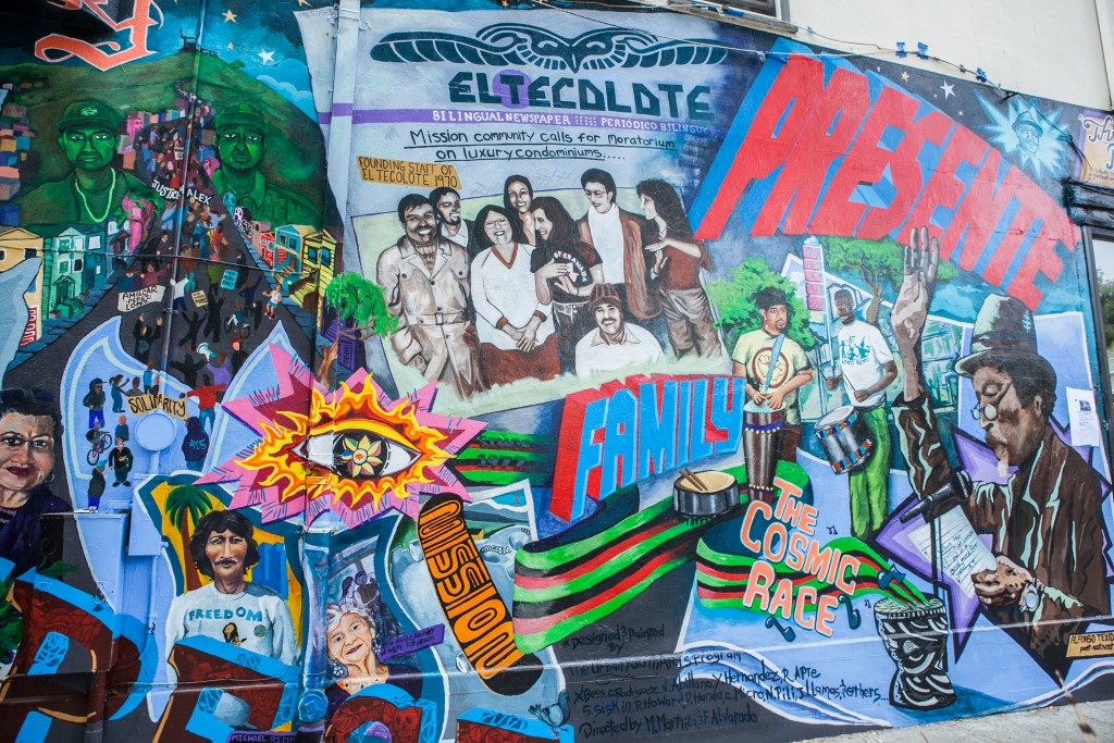 “This Place,” a mural completed by Precita Eyes Muralists Association and Center, is dedicated to the Mission community, featuring former staff of El Tecolote newspaper and its founder, Juan Gonzales. Located the corner of 24th and Folsom Streets in San Francisco on Saturday, Aug. 8, 2015. (Photo by Ekevara Kitpowsong/ The Guardsman)