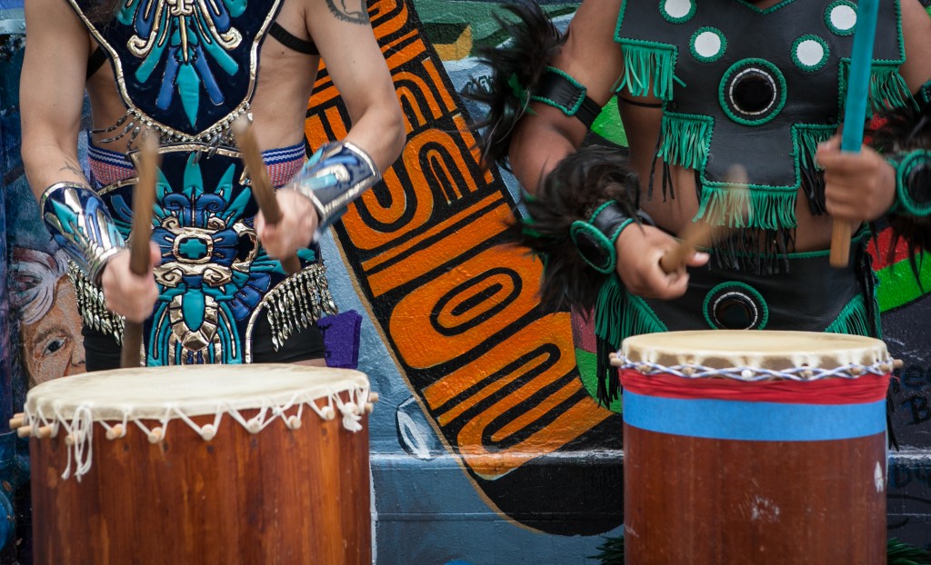 Two drummers perform during spiritual traditional dancing for the opening of the mural celebration at the corner of 24th and Folsom streets on Saturday, Aug. 8, 2015. (Photo by Ekevara Kitpowsong/TheGuardsman)