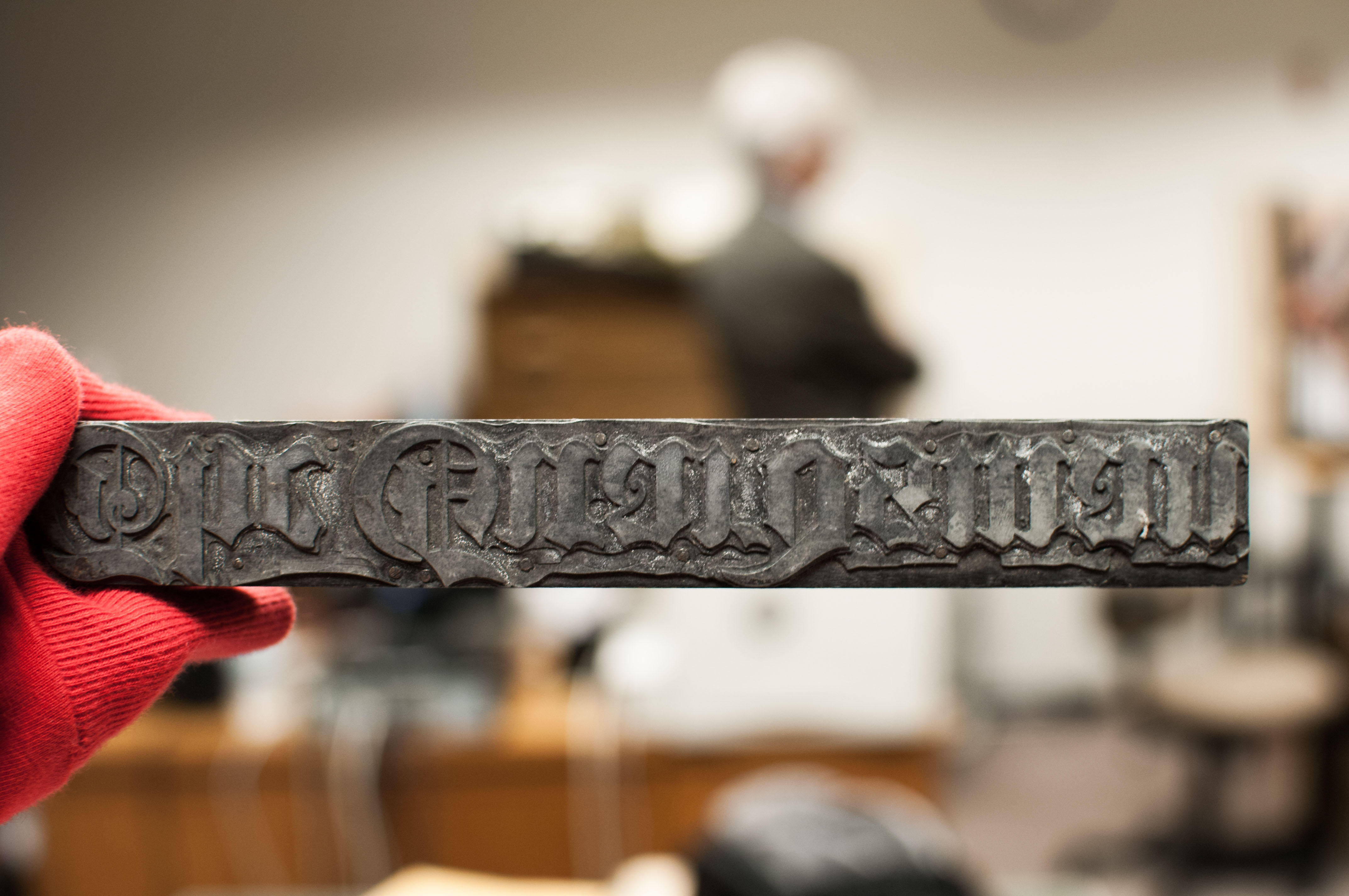Retired Guardsman title letter press metal stamp in The Guardsman Newspaper archives at Rosenberg Library building on Ocean Campus. Monday, April 20, 2015. (Photo by Otto Pippenger/ The Guardsman)