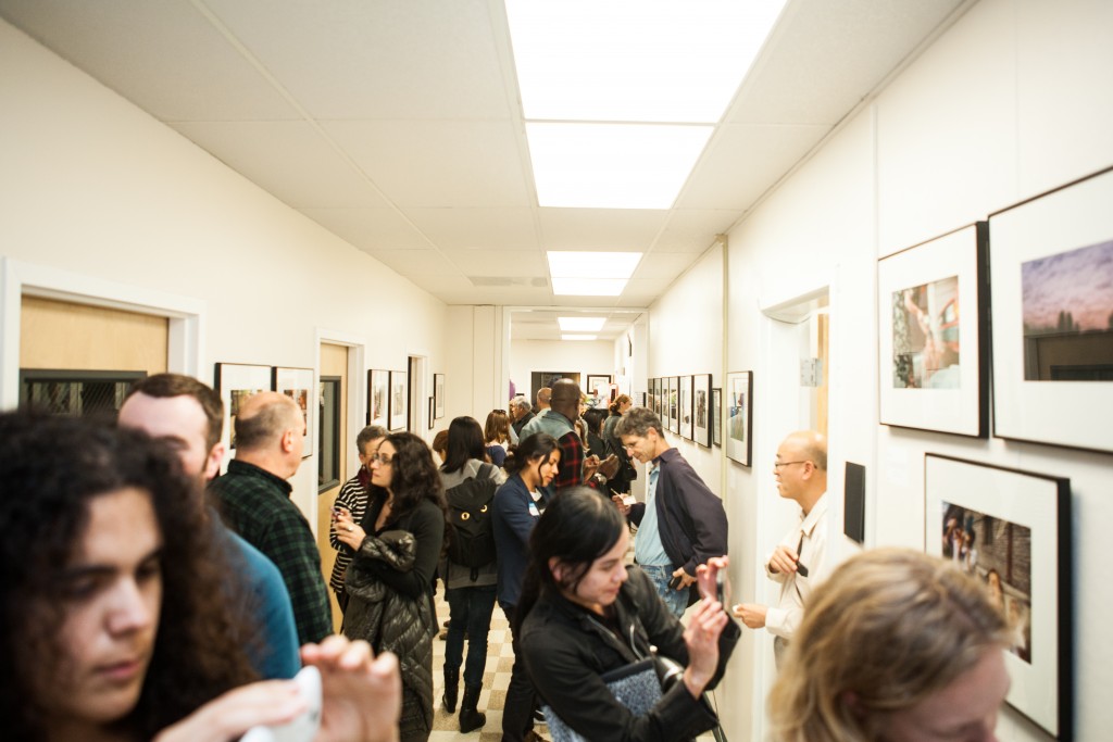 Approximately 100 guests attended the opening reception for “Faces of Hope” at Front Page Gallery in Bungalow 615 on the Ocean Campus. Thursday, Sept. 17, 2015. (Photo by Ekevara Kitpowsong/The Guardsman)