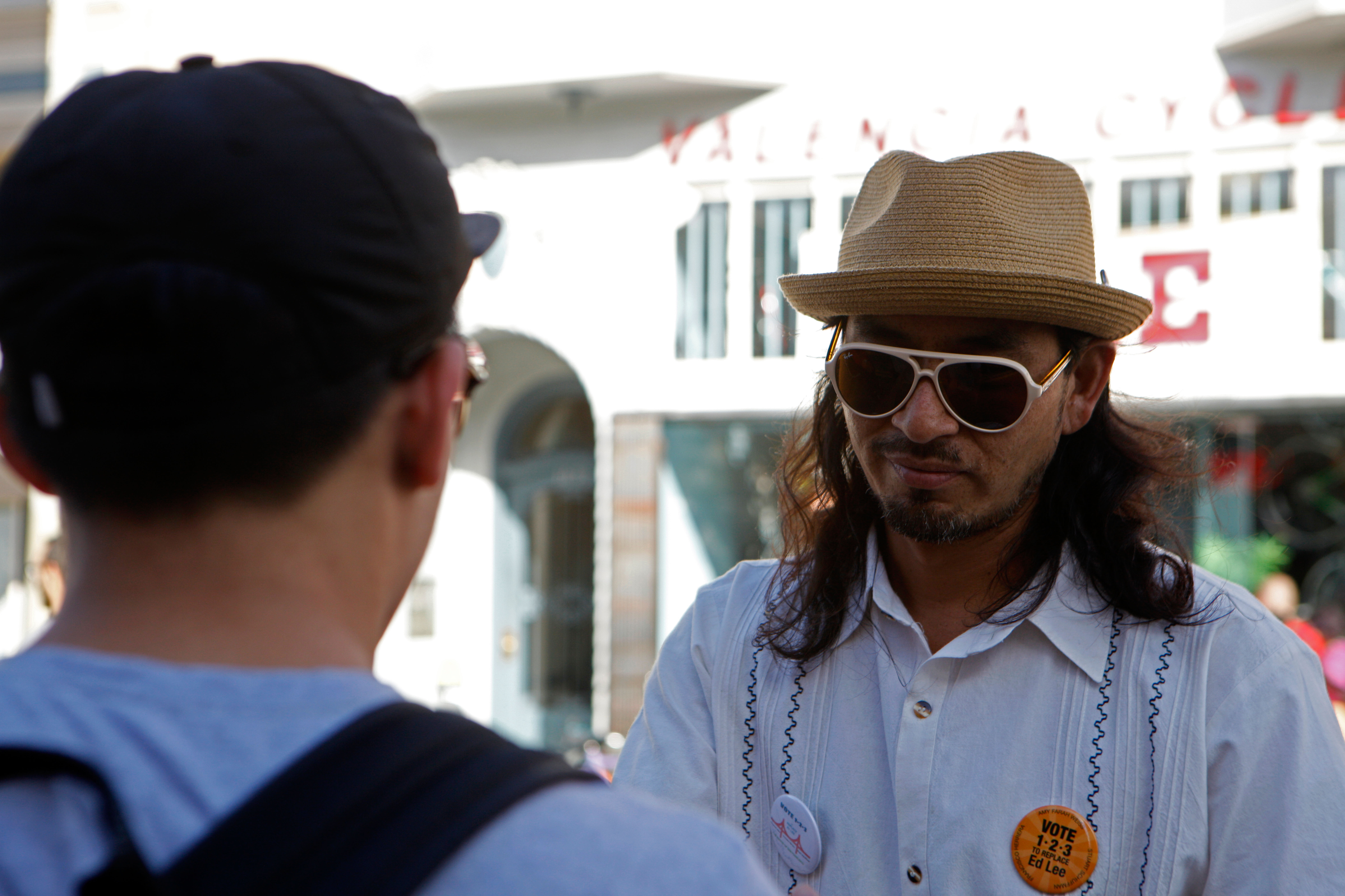 Local rapper and former City College student Equipto hands out information and talks to people about the "Vote 1-2-3 To Replace Ed Lee" campaign during Sunday Streets on Valencia Street on Sunday, Oct. 18, 2015. (Photo by Franchon Smith/The Guardsman)