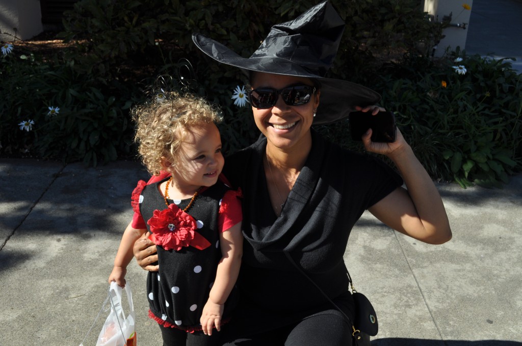 Nadine and Rose pose while trick-or- treating in costume.