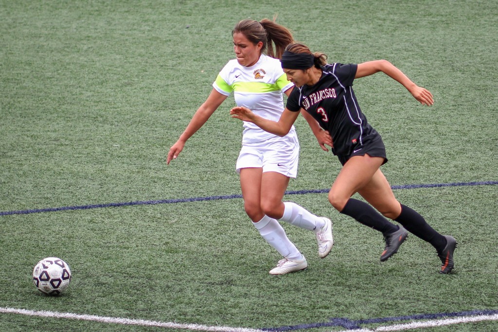 Rams sophomore defender Valentina Camacho Arias (3) tackles and gets past a Cañada College during the first half of a CCCAA women's soccer match at Ocean Campus, Tuesday, Oct. 27, 2015. (Photo by Santiago Mejia/The Guardsman)