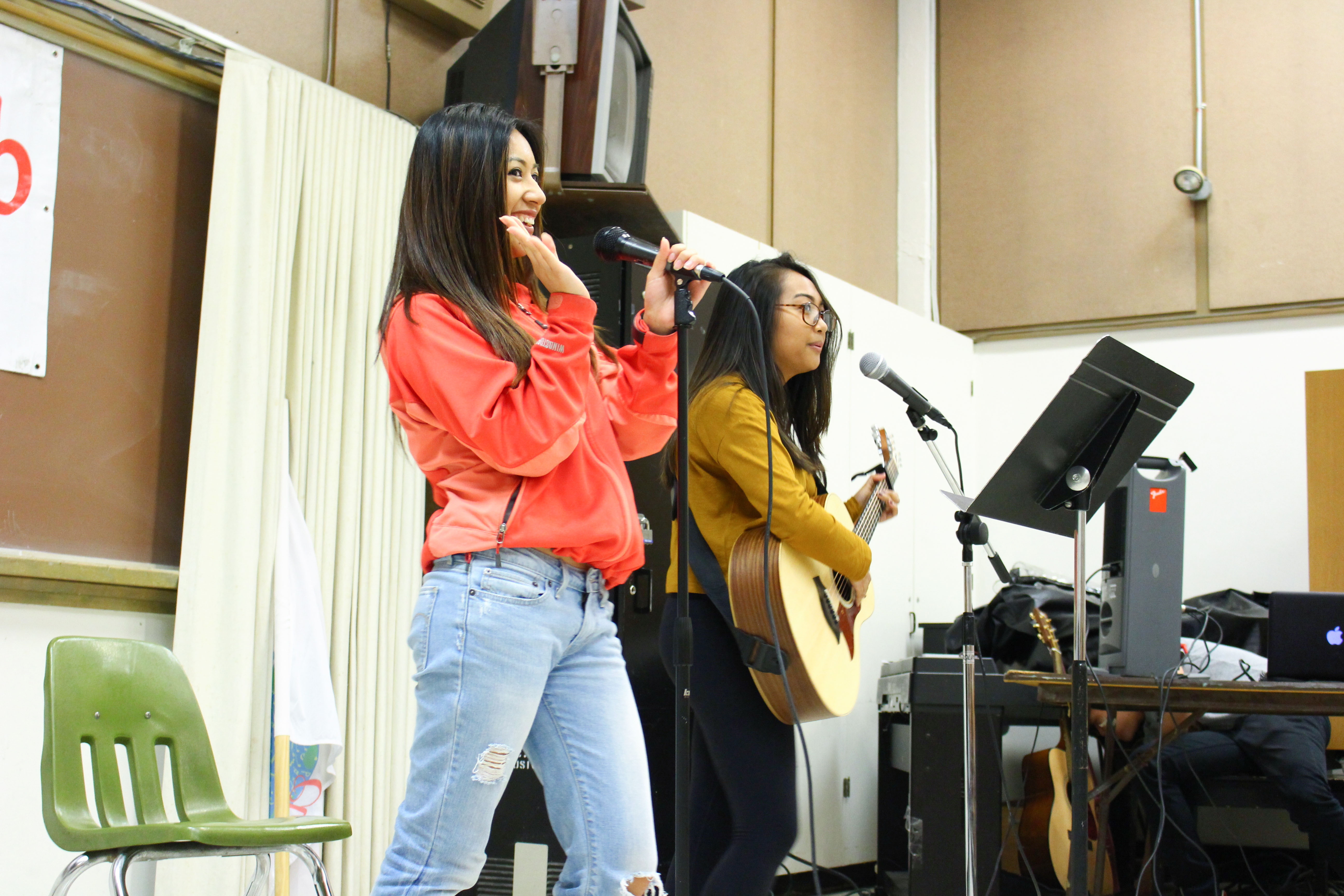 Margaret Delossantos and Jessie Bisco perform as a duet at the World Music Club’s Singing Contest on Friday, Nov. 20, 2015. (By Shannon Cole/The Guardsman