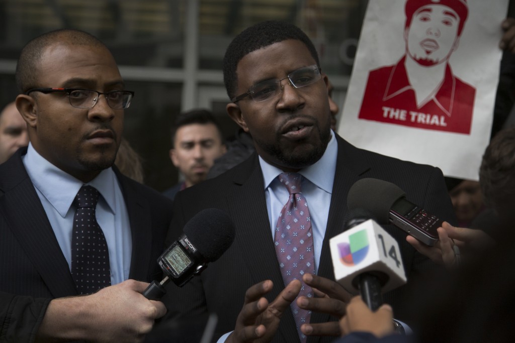 Nieto family attorneys Lateef Grey (left), and Adante Pointer (right), speak on the trial ruling at the Federal Court building on March 10, 2016. (Photo by Gabriella Angotti-Jones / The Guardsman)