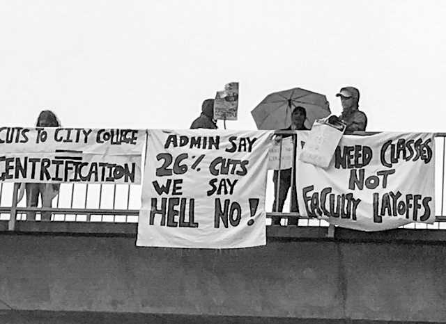 AFT 2121 members hang banners over the Muni overpass on Ocean avenue on April 27, 2016. (Photo by Danya Aispuro/Special to The Guardsman)participate in a one day strike in front of the Ocean campus on April 27, 2016. Photo by Danya Aispuro/Special to The Guardsman