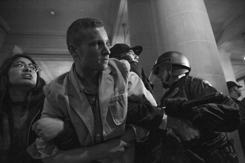 A protester is arrested during a Hunger for Justice SF occupation of City Hall last night. 33 people were arrested. Protesters demanded action against police brutality and for SFPD Chief Suhr to be fired. (Photo by Gabriella Angotti-Jones).