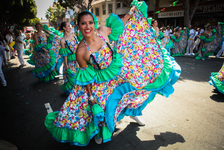 Carnaval performers dance in the 38th Annual Carnaval San Francisco grand parade on 24th Street in San Francisco during Memorial Day weekend, Sunday, May 29, 2016. (Photo by Ekevara Kitpowsong)