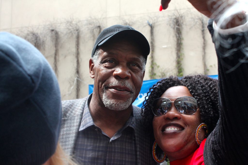 Danny Glover, actor and avid Sanders supporter, takes photos with a crowd of fans after the canvassing kick-off on Monday, June 6, 2016. (Photo by Audrey Garces/The Guardsman)
