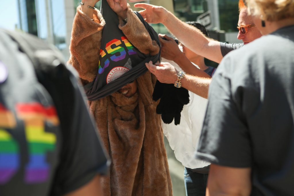 Cas Ruffin, dressed as the Rams mascot, struggles to remove his T-shirt before the San Francisco Pride Parade in the City College on June 26, 2016. (Photo by Cassie Ordonio/The Guardsman)