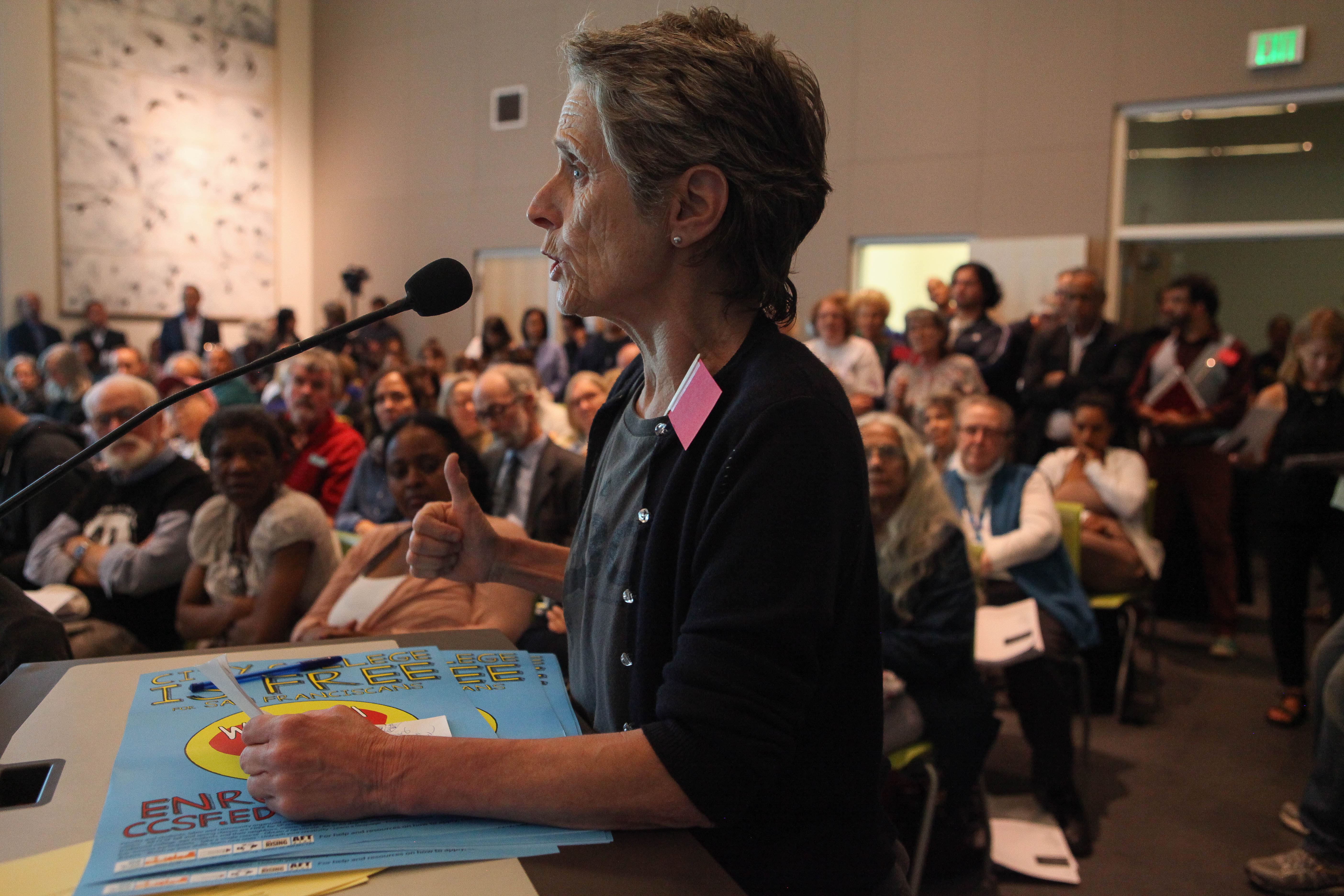 AFT member Kathe Burick emotionally voices her opposition of a controversial chancellor at City College of San Francsico's Board of Trustees meeting on June 22, 2017.