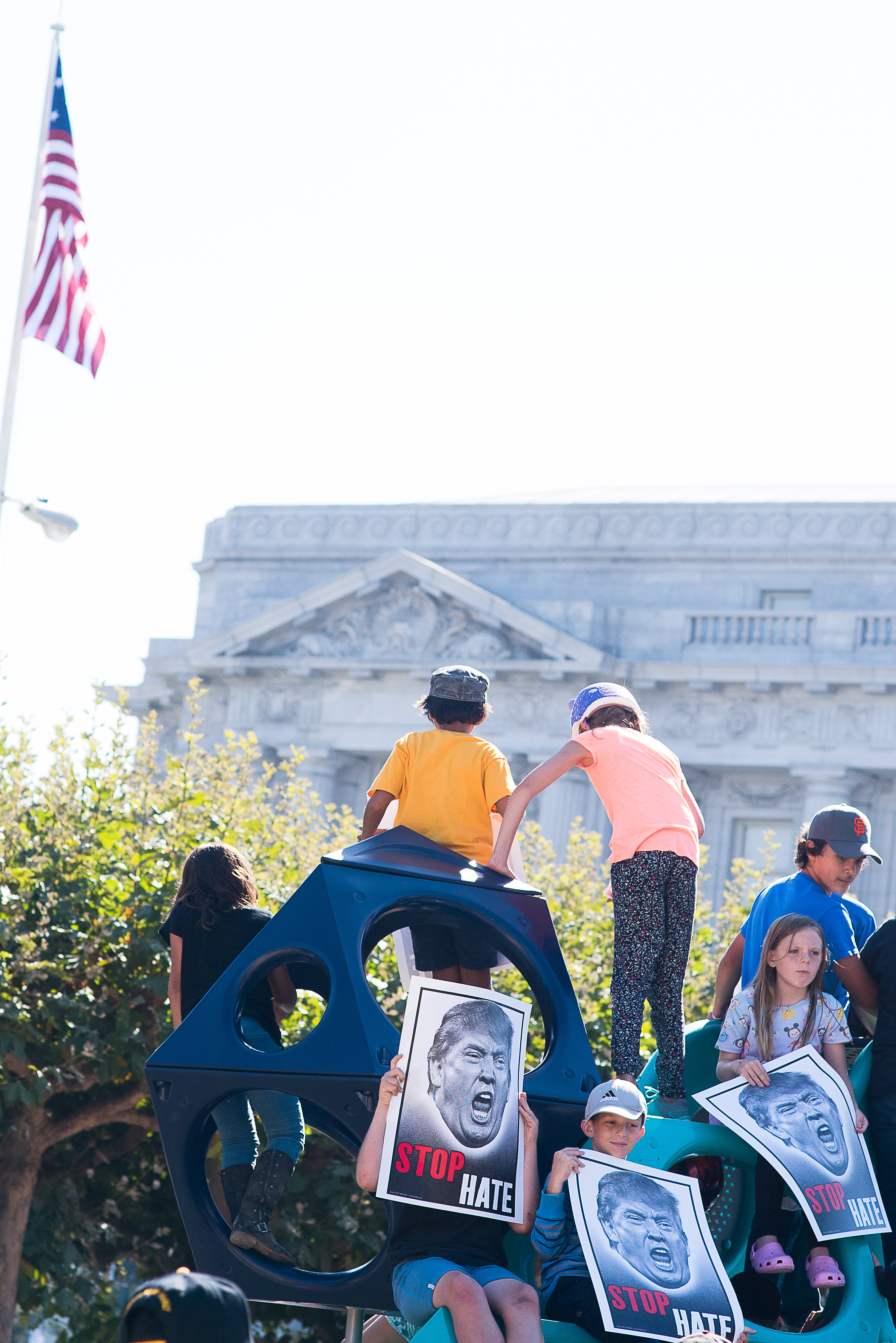 Children of demonstrators on play structure before City Hall at counter-demonstration. Photo taken on Aug 26, 2017 by Otto Pippenger.