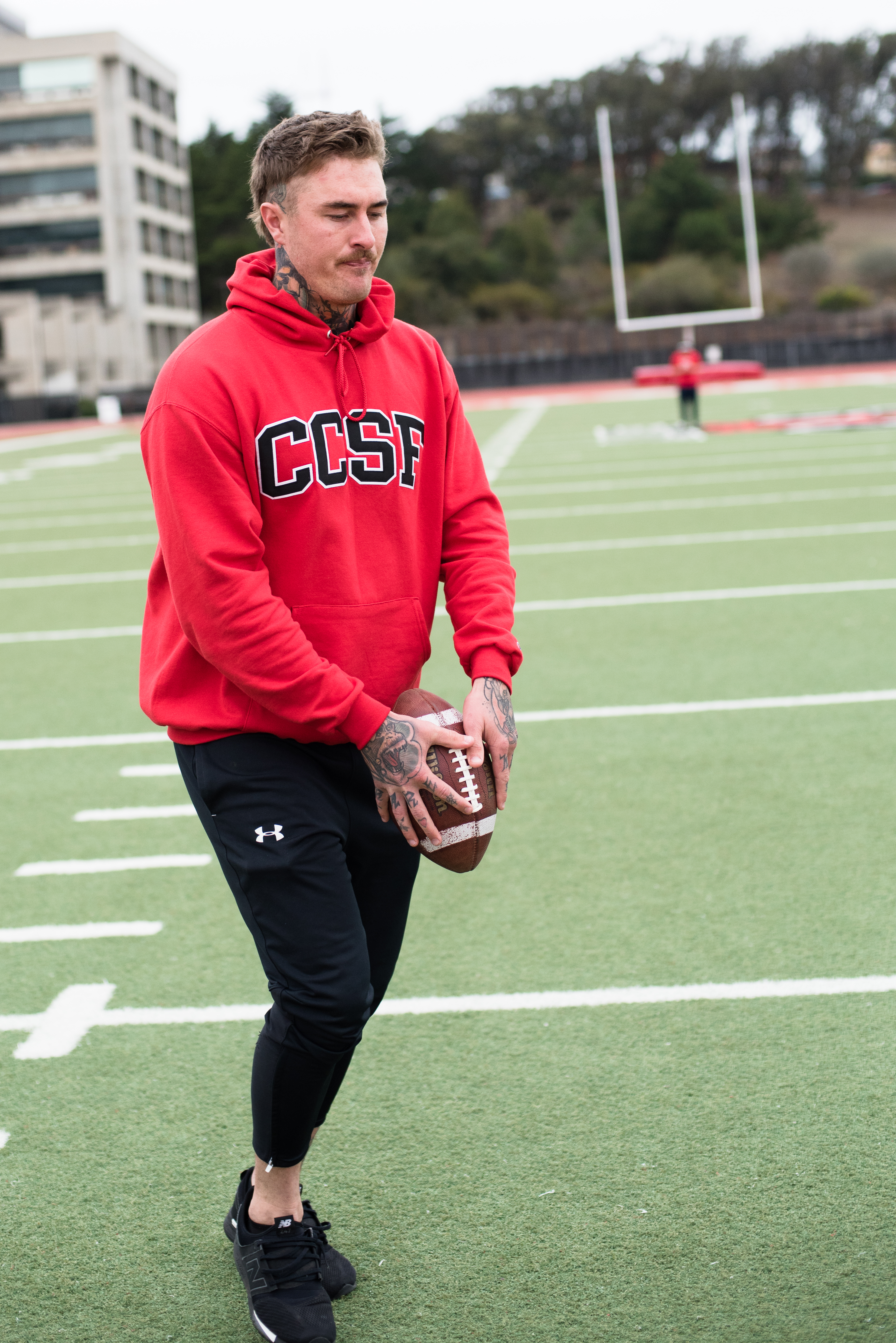 City College Rams #93, punter Louis Headley practices his celebrated kick on the football field at City College’s Ocean Campus on Nov. 20, 2017. Photo by Otto Pippenger.