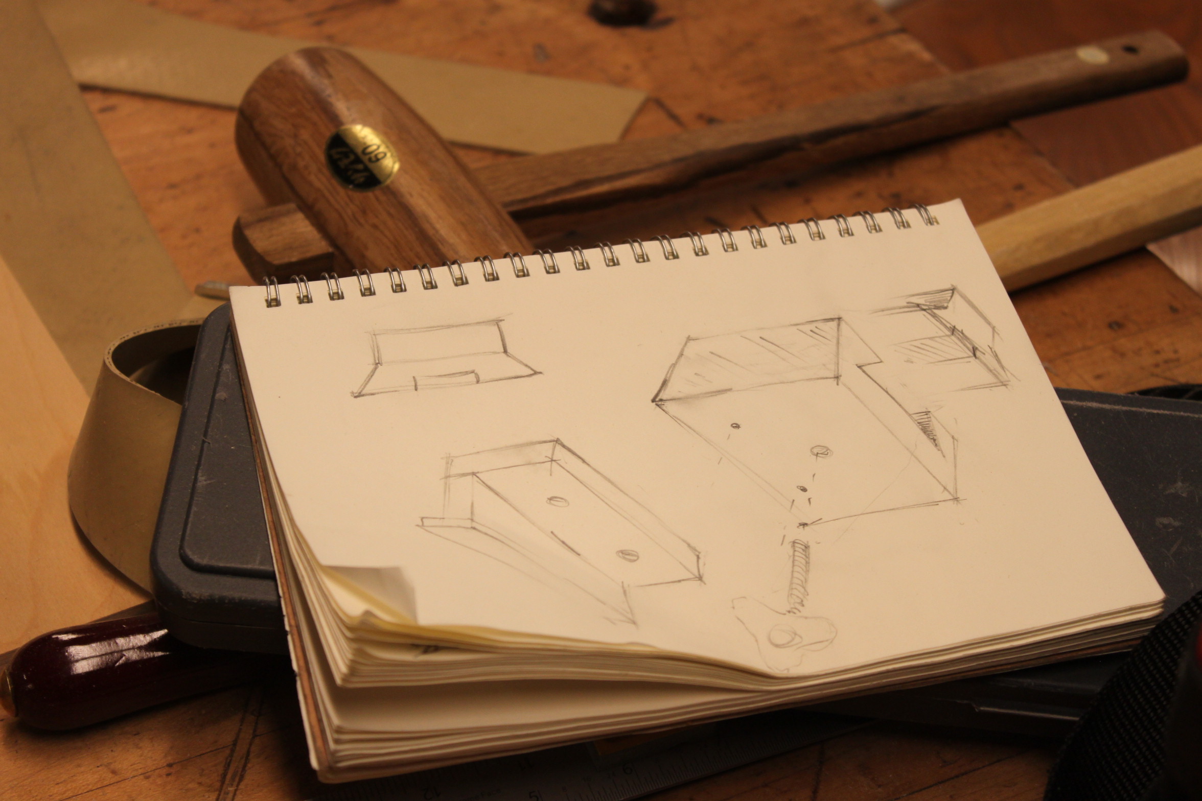 Laying open on a workbench sits Trevor Rogers’ carpentry sketchbook. Photo taken on Nov. 13, 2017. 