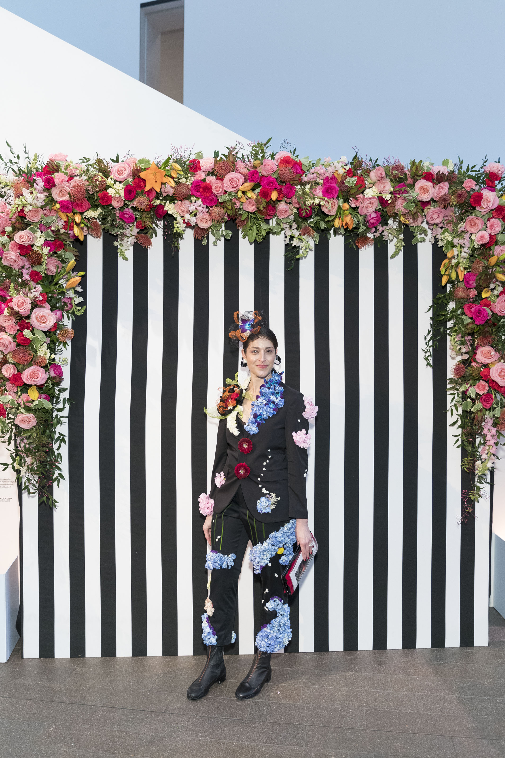 Shari Wilk created this floral pantsuit modeled by Betsey Herczeg-Konecney at the Bouquets to Art Gala on March 12, 2018 at de Young Museum in San Francisco, CA. Photo by Drew Altizer/Courtesy of the Fine Arts Museum of San Francisco. 