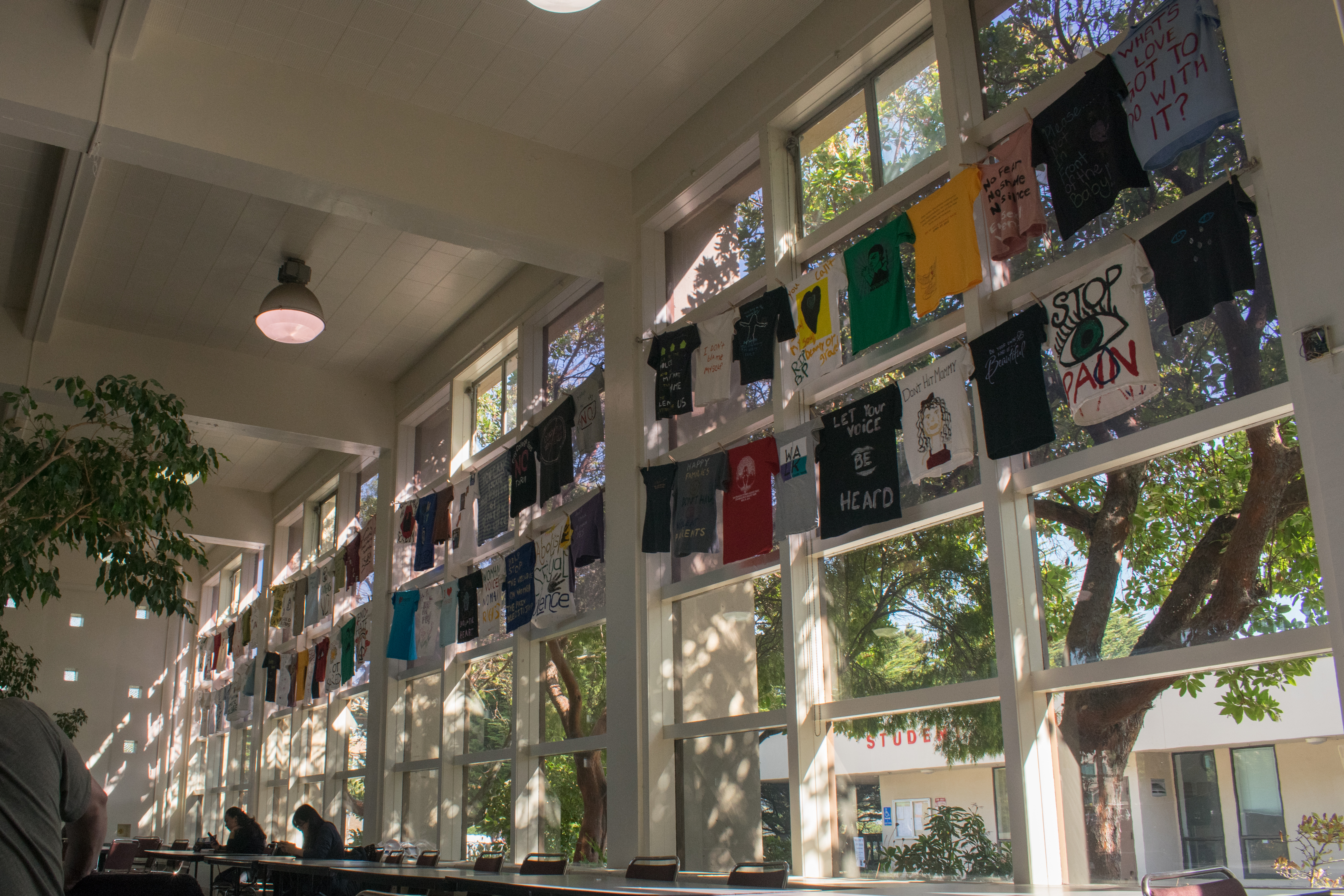 The City College Cafeteria is decorated with 67 shirts advocating against domestic violence. Photo by Sarah Berjan/ the Guardsman. 
